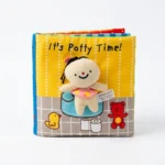 كتاب قماشي تفاعلي للتدريب على الحمام "It's Potty Time" مع دمية
